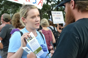 ACLU of Florida Field Coordinator Nikki Fisher distributing material at the Rally Against Voter Suppression in Ybor City